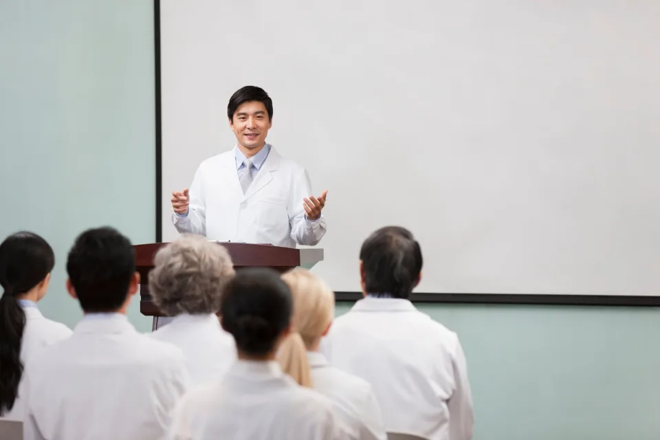 Doctor giving a lecture to healthcare colleagues